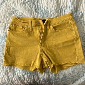 yellow j crew mercantile cut off shorts